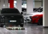 현대차그룹 주차로봇, 월패드 출차·이중주차 해소 시연 공동주택 지하주차장에서 차량 이동을 시연하는 현대위아 주차로봇